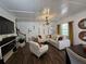Bright living room with stylish furniture, modern accents, beautiful flooring, and natural light at 60 Cottontail Lane, Villa Rica, GA 30180