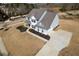 An aerial view reveals the home's large driveway, manicured landscaping, and well-maintained lawn at 6801 Louis Dr, Locust Grove, GA 30248