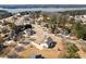 This aerial shot showcases the property's proximity to the lake and highlights the surrounding neighborhood at 6801 Louis Dr, Locust Grove, GA 30248