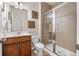 Modern bathroom with walk-in shower, granite countertops, and wood cabinets at 6801 Louis Dr, Locust Grove, GA 30248