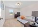 Bedroom with cozy furnishings and soft carpet at 6801 Louis Dr, Locust Grove, GA 30248