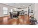 Eat-in kitchen with stainless steel appliances, granite countertops, and center island at 6801 Louis Dr, Locust Grove, GA 30248