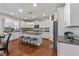 Bright kitchen features stainless steel appliances, granite countertops, and kitchen island with seating at 6801 Louis Dr, Locust Grove, GA 30248