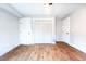 Bedroom with two entries and closet featuring bi-fold doors at 1919 Pair Sw Rd, Marietta, GA 30008