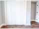 Bedroom closet features bi-fold doors and modern paint at 1919 Pair Sw Rd, Marietta, GA 30008