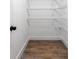 Walk-in closet with wire shelving and hardwood floors at 1919 Pair Sw Rd, Marietta, GA 30008