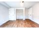 Bedroom closet doors are open to reveal shelves at 1919 Pair Sw Rd, Marietta, GA 30008