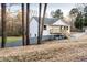 Two story home with a side view, with porch and landscaping at 1919 Pair Sw Rd, Marietta, GA 30008