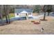 Well-maintained home with a welcoming front porch and landscaped yard at 1919 Pair Sw Rd, Marietta, GA 30008