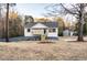 Charming, newly renovated two-story home featuring a welcoming front porch and beautifully landscaped front yard at 1919 Pair Sw Rd, Marietta, GA 30008