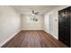 Basement features hardwood floors, neutral walls, ceiling fan and white trim at 441 Windsor Dr, Forest Park, GA 30297