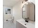Updated bathroom with new vanity, tile floors, sink and mirror at 441 Windsor Dr, Forest Park, GA 30297