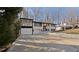 Beautiful home with a large driveway, attached garage and white brick facade at 441 Windsor Dr, Forest Park, GA 30297