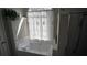 Bright bathroom featuring a tub with window, offering a serene and spa-like atmosphere at 70 Woodcliff Way, Covington, GA 30014