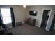 A simple bedroom setup, with attached bathroom, offers functionality and style at 70 Woodcliff Way, Covington, GA 30014