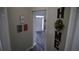 Entryway features gray walls with home decor and dark wood-look floors at 70 Woodcliff Way, Covington, GA 30014