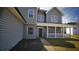 Inviting front entrance with a covered porch and a 
