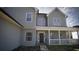 Inviting front entrance with a covered porch and a 