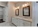 Luxurious bathroom with double vanities and a walk-in closet at 1043 Harvest Park Ln, Suwanee, GA 30024