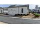 New construction home with fence, landscaping, and private alley access at 1043 Harvest Park Ln, Suwanee, GA 30024