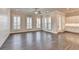 Spacious living room with recessed lighting and hardwood flooring, showcasing a modern aesthetic at 1043 Harvest Park Ln, Suwanee, GA 30024