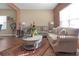 Cozy living room with hardwood floors, neutral paint, and comfortable seating at 1152 Werre Way, Locust Grove, GA 30248