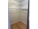 Walk-in closet with built-in shelving to allow for optimum storage and organization at 118 Hawkstone Way, Alpharetta, GA 30022