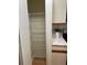 Spacious walk in pantry with shelving for plenty of storage in the kitchen at 118 Hawkstone Way, Alpharetta, GA 30022