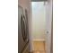 Walk in pantry next to a stainless steel refrigerator, great for extra storage at 118 Hawkstone Way, Alpharetta, GA 30022