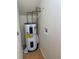 Utility room showing a water heater and laundry hookups at 118 Hawkstone Way, Alpharetta, GA 30022