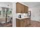 Stylish dining area with built-in cabinets, modern lighting, and a view to the outside at 1654 Tide Mill Rd, Cumming, GA 30040
