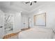 Comfortable bedroom featuring recessed lighting, a ceiling fan, a serene color palette, and an adjacent bathroom at 2117 Brannen Se Rd, Atlanta, GA 30316