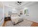 Bright bedroom with ceiling fan, recessed lights, a comfortable bed, and windows offering natural light at 2117 Brannen Se Rd, Atlanta, GA 30316