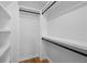 Spacious walk-in closet with custom shelving and ample storage space for an organized wardrobe at 2117 Brannen Se Rd, Atlanta, GA 30316