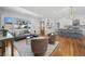 Bright living room features hardwood floors, modern furniture, and large windows showcasing the neighborhood at 2117 Brannen Se Rd, Atlanta, GA 30316