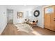 Cozy living area with stylish seating, an accent mirror, and a modern aesthetic at 2117 Brannen Se Rd, Atlanta, GA 30316