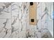 Luxurious marble tile shower with rainfall shower head and modern fixtures, creating a spa-like experience at 2117 Brannen Se Rd, Atlanta, GA 30316