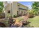 Beautiful backyard with a fire pit and wooden deck perfect for outdoor entertaining at 3595 Evonvale Overlook, Cumming, GA 30041