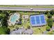 Aerial view of community amenities including a pool, playground, and tennis courts at 3595 Evonvale Overlook, Cumming, GA 30041