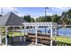 Outdoor tennis courts with shaded seating areas and pristine courts offer an active lifestyle at 3595 Evonvale Overlook, Cumming, GA 30041