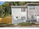 Inviting two-story home with crisp, white siding and neat landscaping for a cozy curb appeal at 510 Northridge Crossing Dr, Sandy Springs, GA 30350