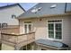 Exterior view featuring a back deck with a dining area at 1111 Newpark View Pl, Mableton, GA 30126