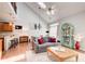 Well-lit living room with high ceilings, hardwood floors, and modern decor at 1111 Newpark View Pl, Mableton, GA 30126
