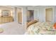 Spacious main bedroom featuring two dressers and access to additional rooms at 1111 Newpark View Pl, Mableton, GA 30126