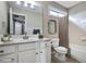 Traditional bathroom with a single vanity, combination tub and shower, and a tiled floor at 484 Martin Se St, Atlanta, GA 30312