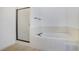 Well-maintained bathroom with a soaking tub and shower with glass door at 484 Martin Se St, Atlanta, GA 30312