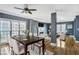 Spacious dining room featuring stylish decor, hardwood floors, and a cozy fireplace for Gathering gatherings at 484 Martin Se St, Atlanta, GA 30312