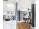 Inviting dining area with hardwood floors, stylish lighting, and a wine rack near the countertop at 484 Martin Se St, Atlanta, GA 30312