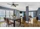 Open concept living room and dining room with hardwood floors and natural light at 484 Martin Se St, Atlanta, GA 30312