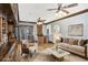 Cozy living room features hardwood floors, built-in shelving, and large windows for natural light at 484 Martin Se St, Atlanta, GA 30312